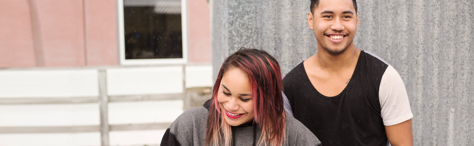 Young man and woman smiling